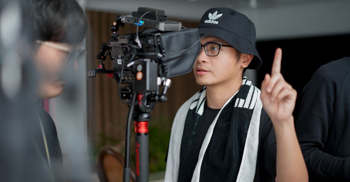 Disney Cancels 'Wonder Man' After Renewal, Sparking Uncertainty Over Marvel's TV Future Director focused on managing film equipment and instructing crew indoors.