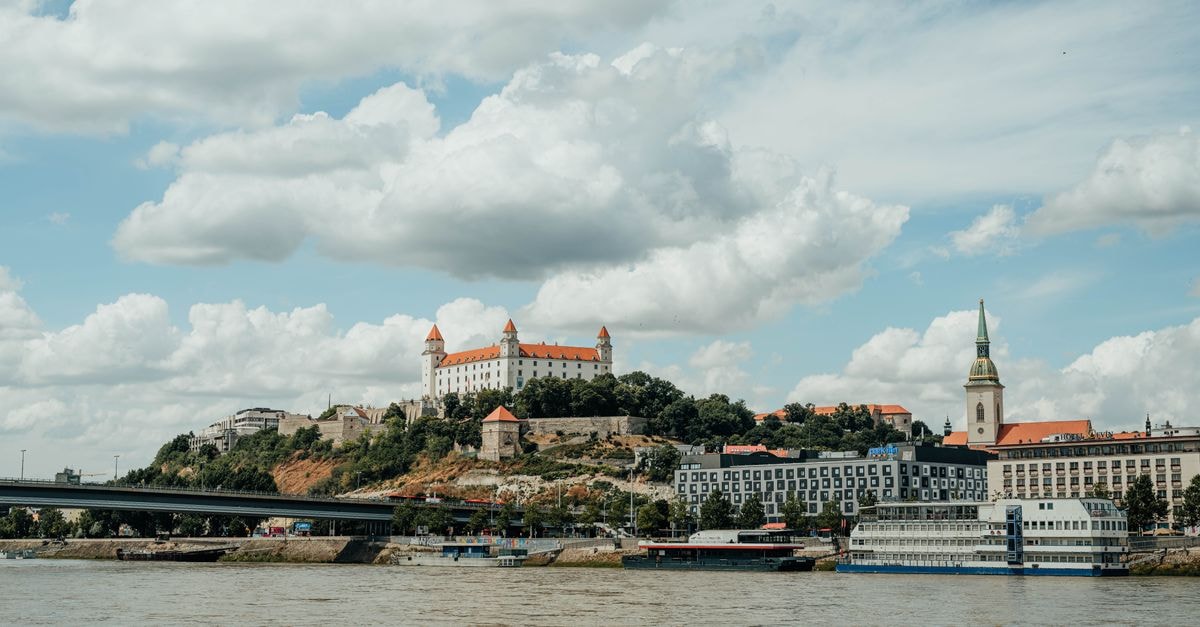 Bratislava Travel Guide: A Slow Weekend in Slovakia's Capital Bratislava's picturesque skyline featuring its historic castle and Danube River.