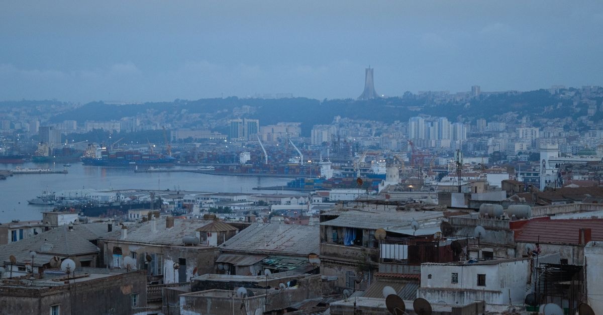 Safwa Hotel in Tripoli: A Cozy Base Near the City's Heart Aerial view of Algiers cityscape showcasing iconic architecture and Martyrs' Memorial.