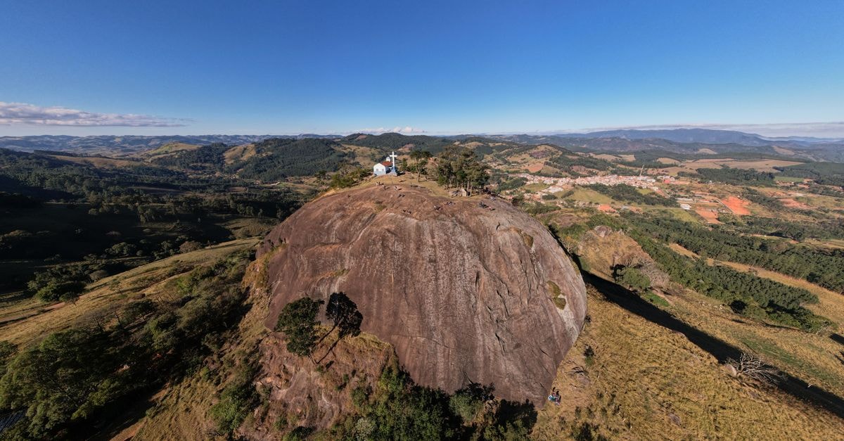 Cachoeiro de Itapemirim Travel Guide for Curious Visitors Breathtaking aerial view of Pedra Bela with its iconic hilltop cross in Sao Paulo, Brazil.