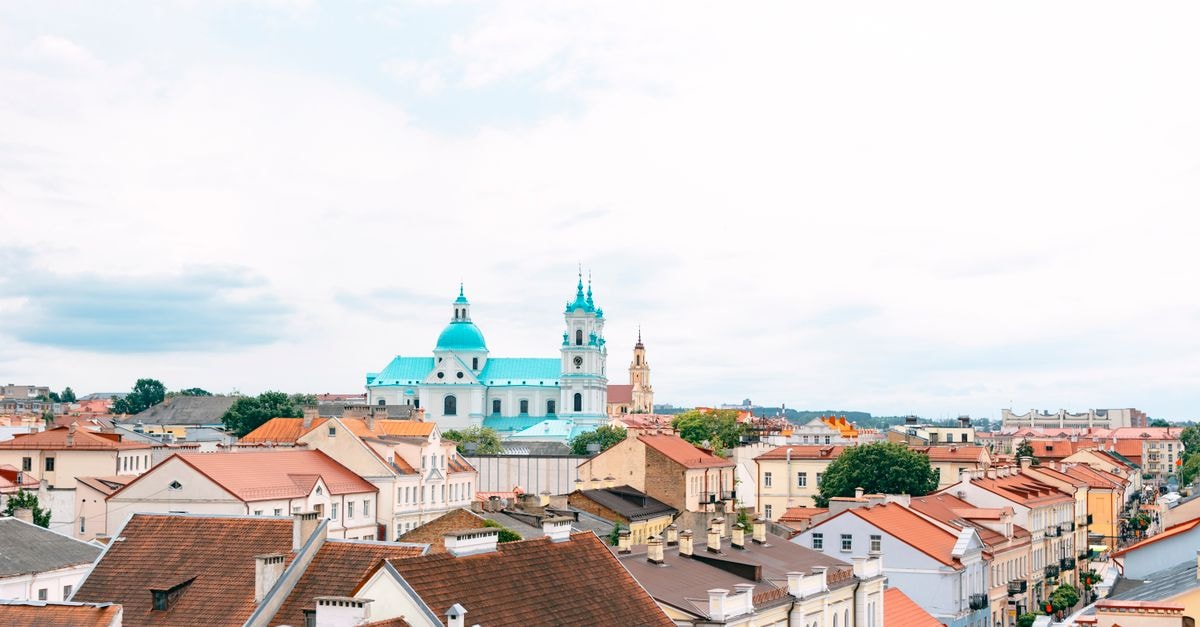 Hotel Babilonas, Kaunas: Quiet Retreat Near Pelėdų Kalnas Beautiful aerial view of Grodno featuring St. Francis Xavier Cathedral and historic architecture.