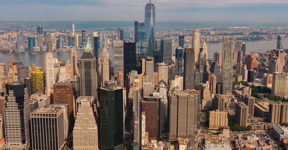 Stunning aerial view of New York City skyline featuring the iconic One World Trade Center.