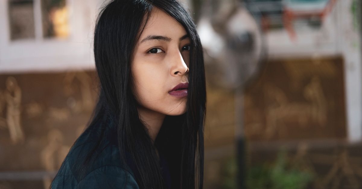 Star Lodge in Guwahati: A Pan Bazar Stop on Ananda Ram Baruah Road Captivating portrait of a young woman with long hair, set in Guwahati, India.