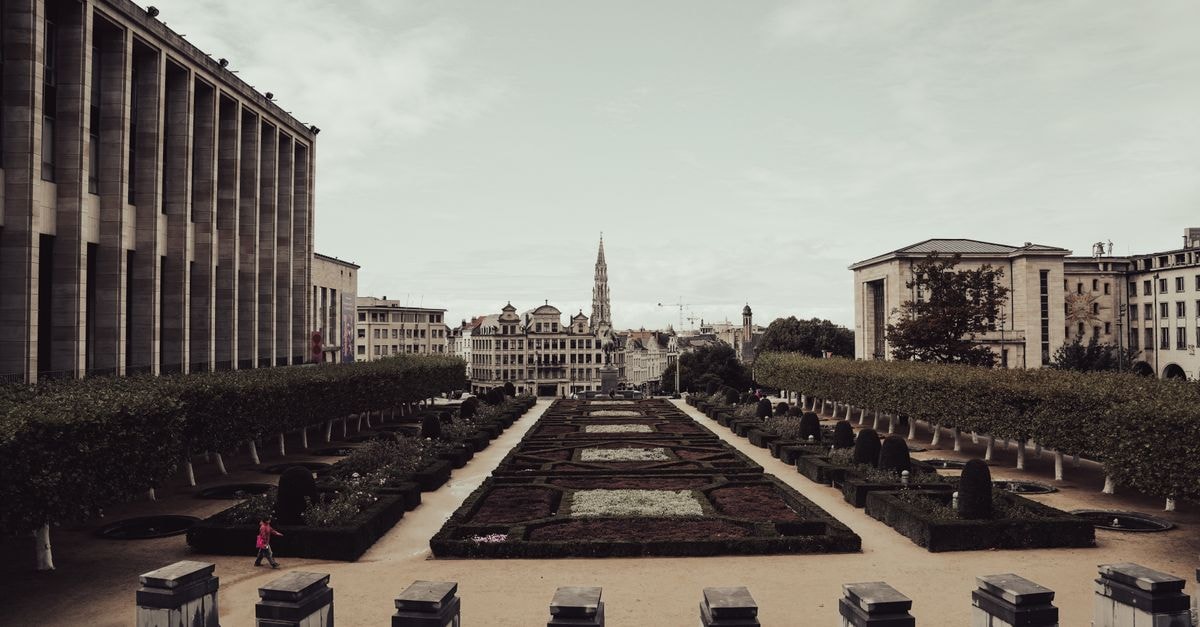 Hotel Amigo, Brussels — A Storied Stay Steps From the Grand-Place A stunning view of the Mont des Arts Garden in Brussels, showcasing classic European architecture.