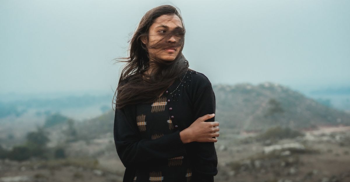 Seventeen-year-old Tanvi Sharma becomes youngest Taipei Open champion, leads India into Korea Masters A young woman embracing the wind in an expansive outdoor landscape in India.