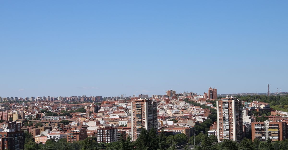 Hotel Logroño NH Herencia Rioja: A Central Old-Town Stay Expansive view of Madrid's urban landscape with clear blue sky and distant horizon.