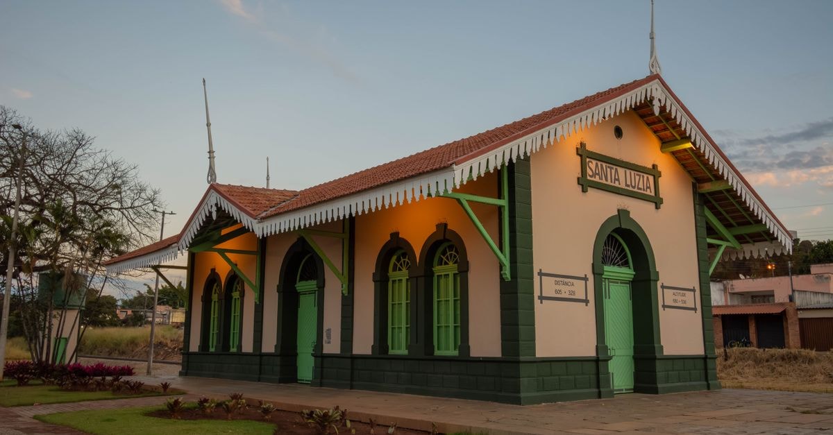 Santa Rosa Travel Guide: Planning Tips, Costs and Things to Do Charming facade of Santa Luzia train station in Minas Gerais during twilight.