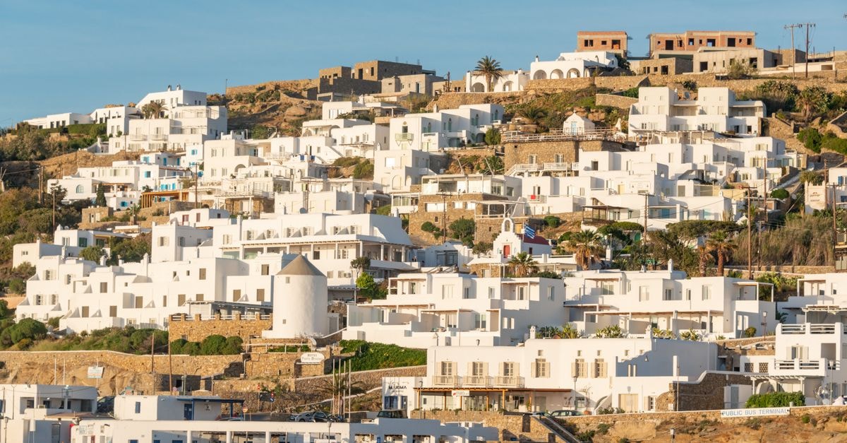 Mykonos travel guide: a slow-creator's look at the Cyclades Scenic view of traditional white homes on a Greek island during daytime.