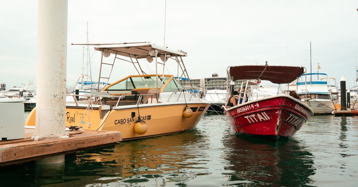 Scenic view of docked boats at Cabo San Lucas marina, ideal for travel imagery.