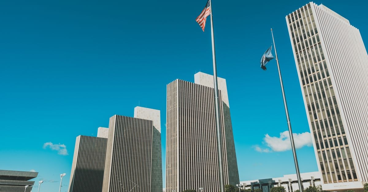 Renaissance Albany Hotel: A 1927 Capitol Hill Landmark Reimagined Modern skyscrapers towering at Empire State Plaza in Albany, New York under a clear blue sky.