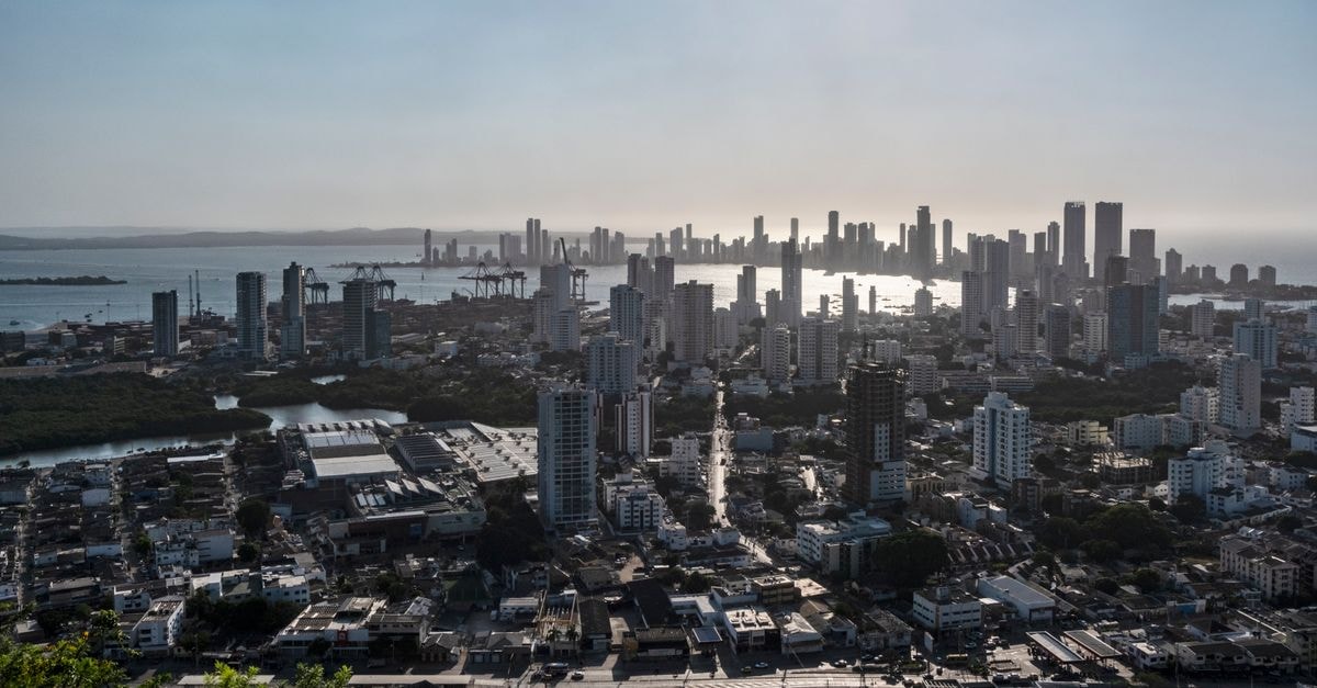 Hotel Edi in Ciudad Bolívar: A Central Stay by Avenida Nueva Granada A breathtaking view of Cartagena's skyline with dense modern skyscrapers and vibrant cityscape.