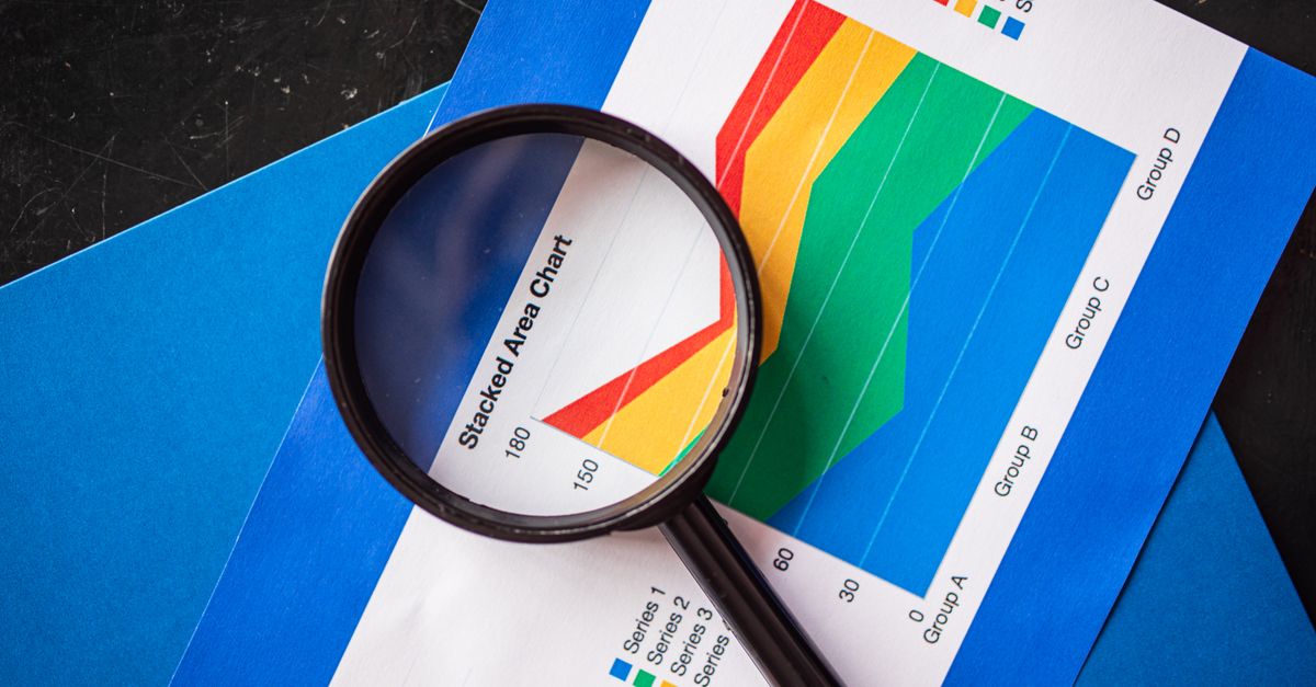 Chinese memory chipmakers lean on ASML's DUV lithography as US scrutiny tightens Magnifying glass highlighting stacked area charts for business analysis.