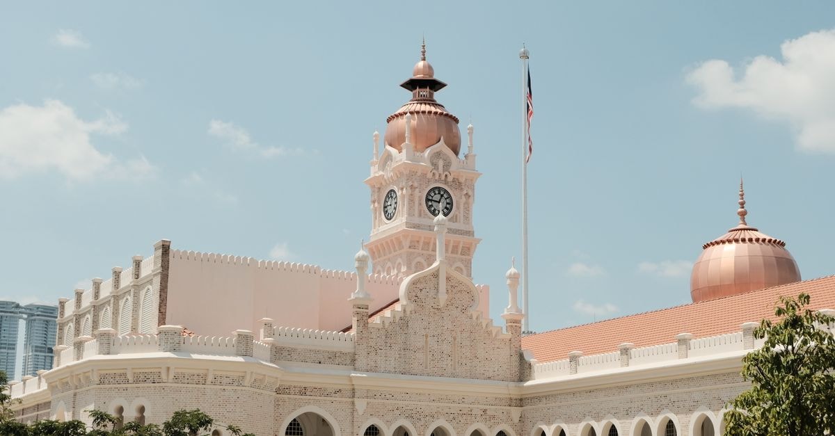 Kuala Lumpur Travel Guide: Three Cultures in One MRT Ride Sultan Abdul Samad Building under a clear sky in Kuala Lumpur.