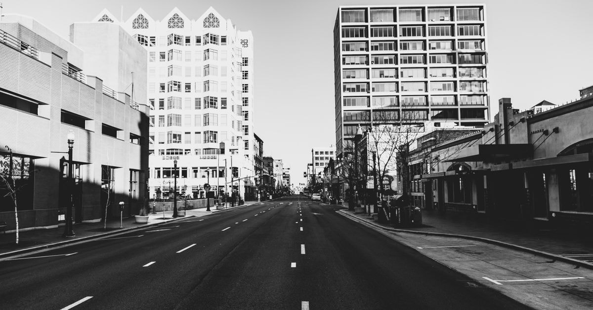 Black and white view of downtown Boise, Idaho featuring urban architecture and an empty street.
