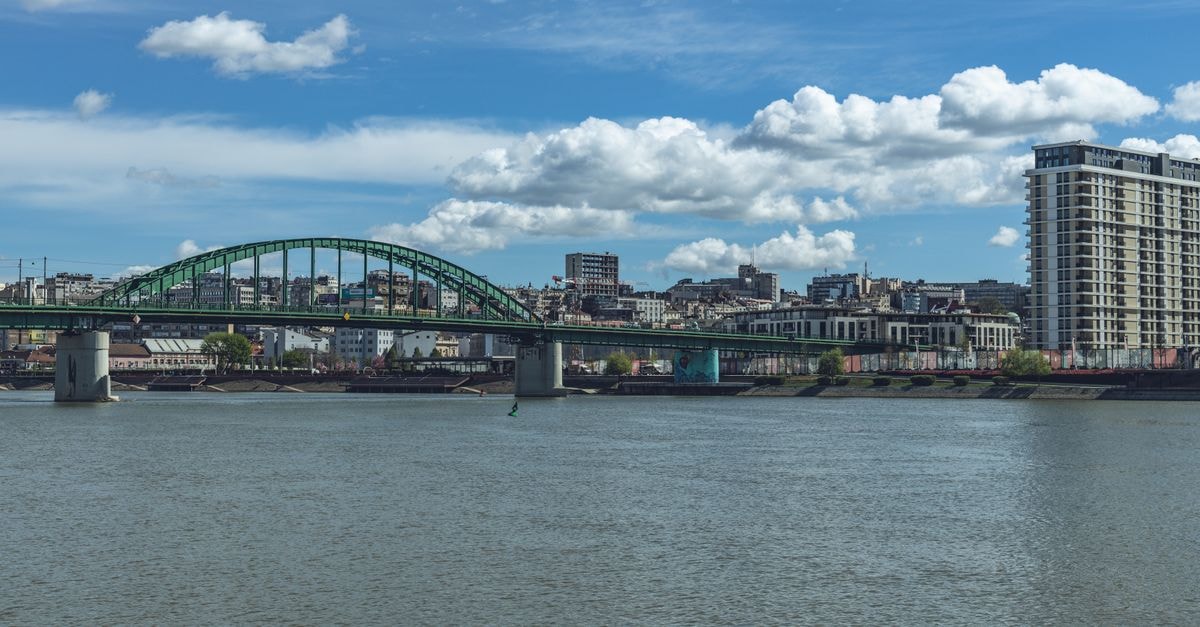 Gonaïves Hotel in Gonaïves: Gateway to the City That Birthed a Nation A breathtaking view of the Old Sava Bridge spanning over the river in vibrant Belgrade, Serbia.