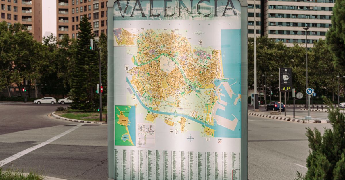 Street map display in Valencia city with urban background.