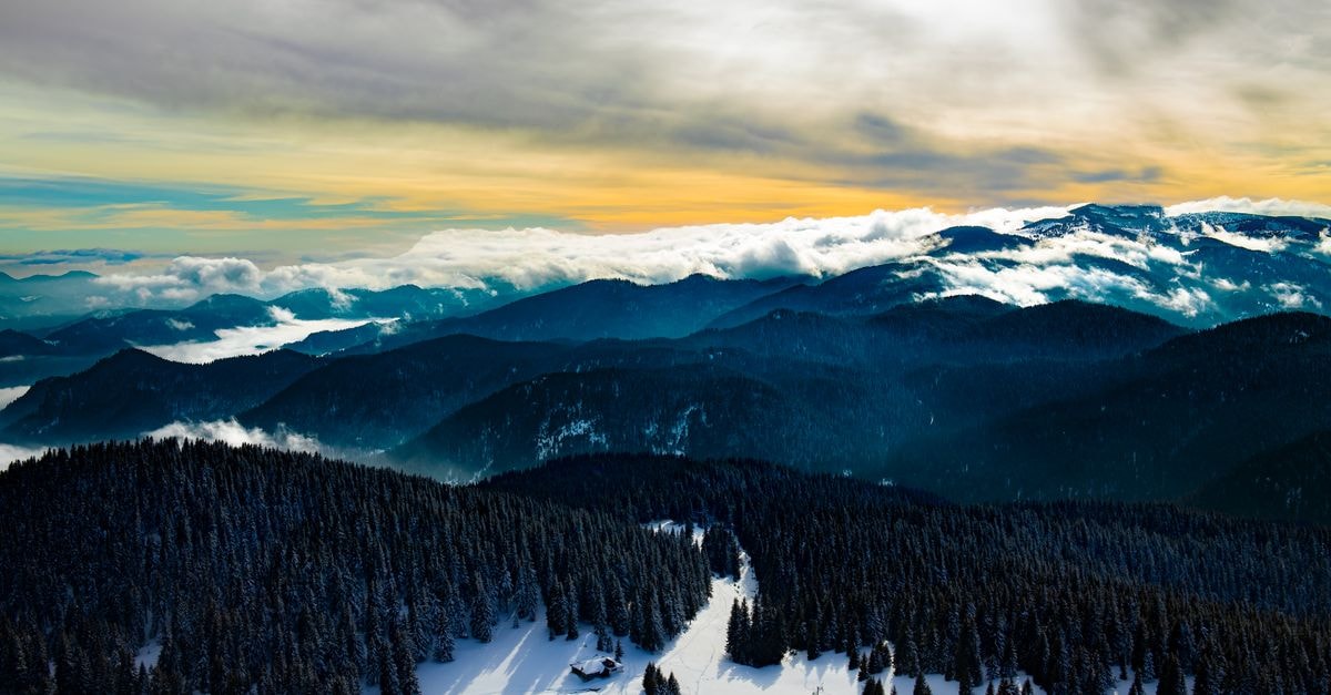 Smolyan Travel Guide: Planning Tips, Costs and Things to Do A stunning aerial view of the snow-covered mountains in Pamporovo, Bulgaria.