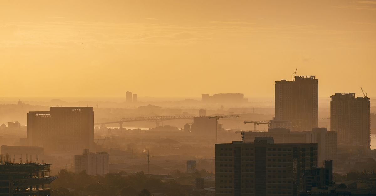 Quest Hotel & Conference Center Cebu: City‑Centre Base Near Ayala Mall Breathtaking aerial view of Cebu City skyline during the golden hour, showcasing urban architecture.