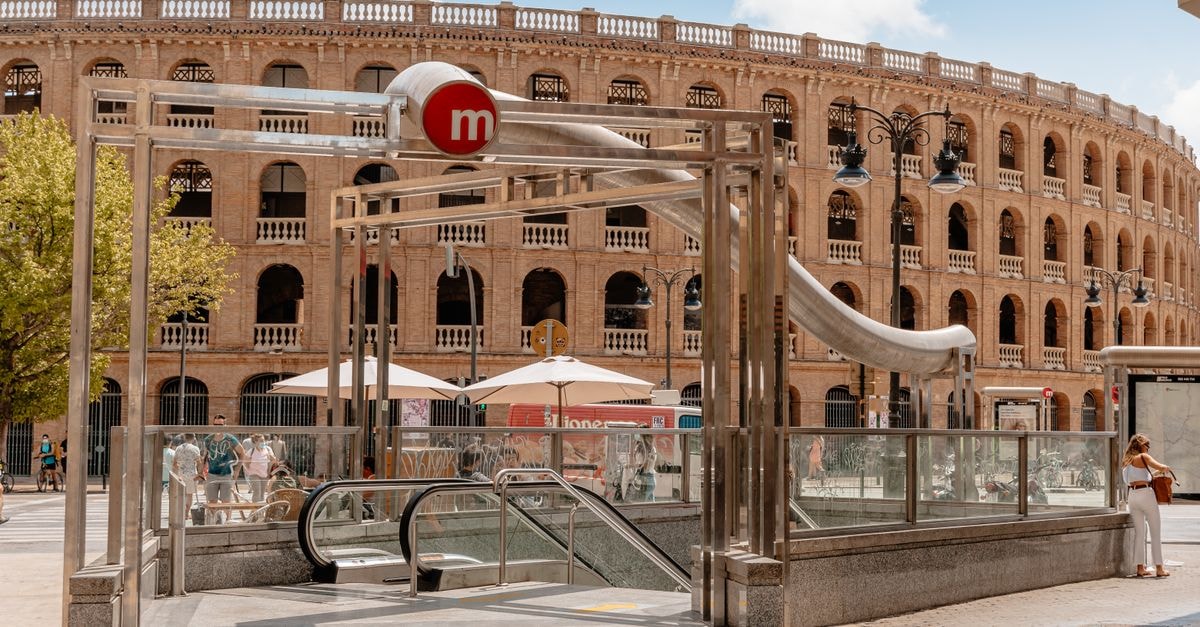 Pamplona Travel Guide: A Pilgrim City Beyond the Bullring Metro entrance near Plaza de Toros in Valencia, Spain, capturing urban architecture.