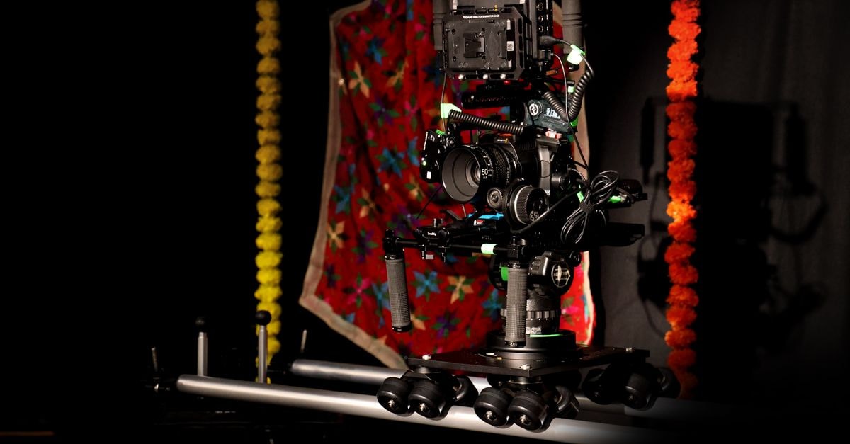 A professional camera rig setup in a vibrant studio space with colorful decorations.