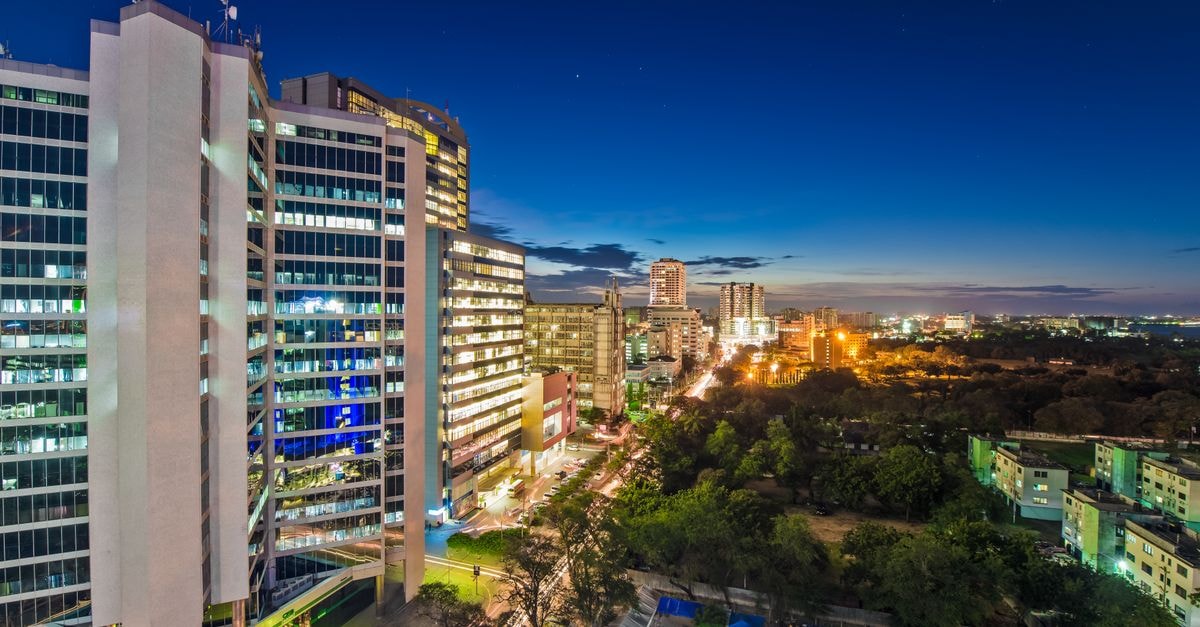 Fatima's Backpackers Hostel, Maputo: An Av. Mao Tsé Tung Base Dynamic night skyline of Dar es Salaam, showcasing illuminated city architecture.