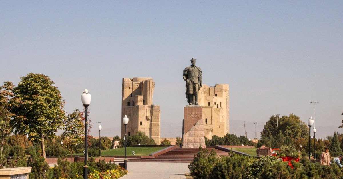 Nakhchivan travel guide: navigating Azerbaijan's quiet exclave Historic monument surrounded by gardens under a bright, clear sky.