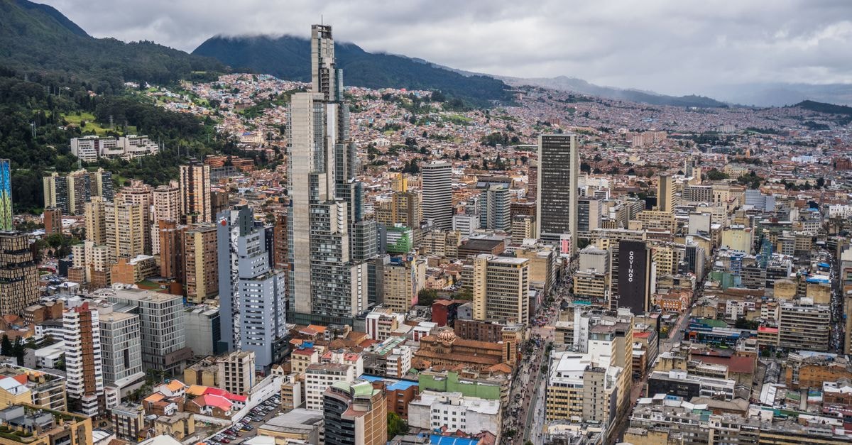 Cúcuta Travel Guide: Warm Andean Air and Living History Aerial view of downtown Bogotá, Colombia showcasing modern skyscrapers and urban layout.