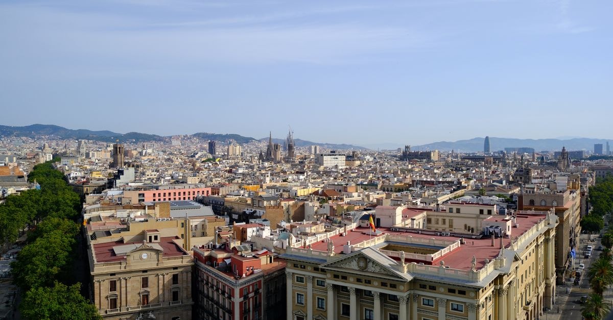 Gran Hotel Las Fuentes in Ciudad Victoria: 103 Deluxe Rooms and a 1,500-Person Fiesta Hall Aerial view of Barcelona showcasing its iconic architecture on a clear day.