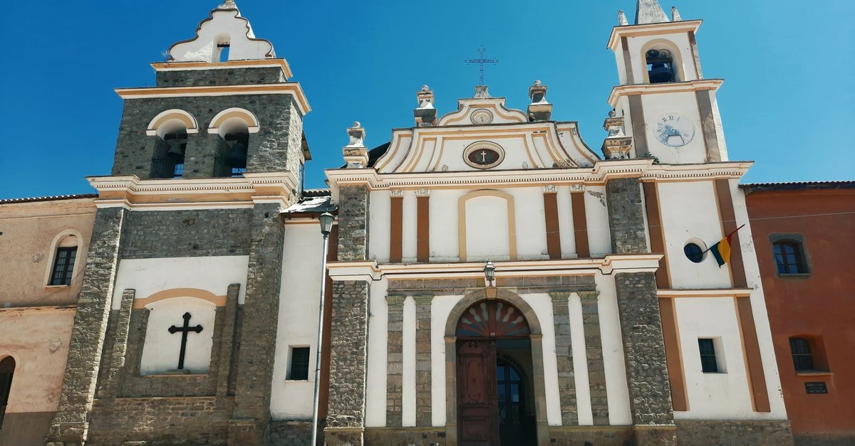 Tucupita Travel Guide: Things to See and Know A historic church facade in Cochabamba, Bolivia showcasing stunning architecture.
