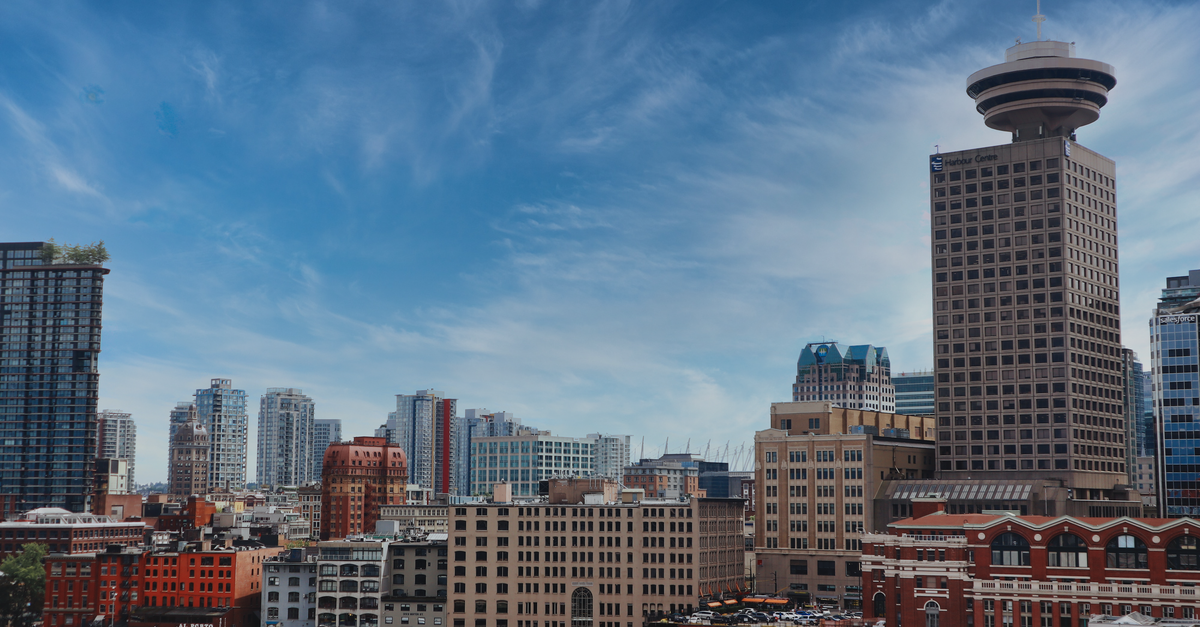 Captivating view of Vancouver's cityscape with prominent city landmarks including Harbour Centre.
