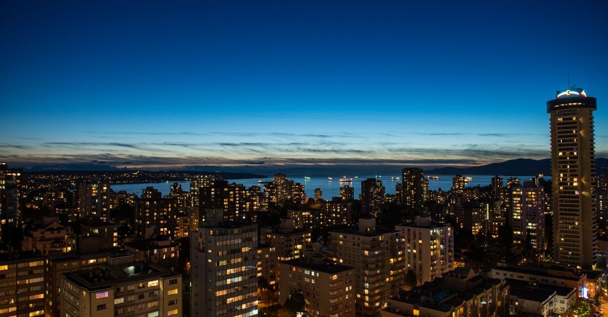 Cambria Hotel Columbia Downtown The Vista in Columbia: Brand Milestone in The Vista District A breathtaking aerial view of Vancouver's vibrant skyline at night, showcasing modern architecture and city lights.