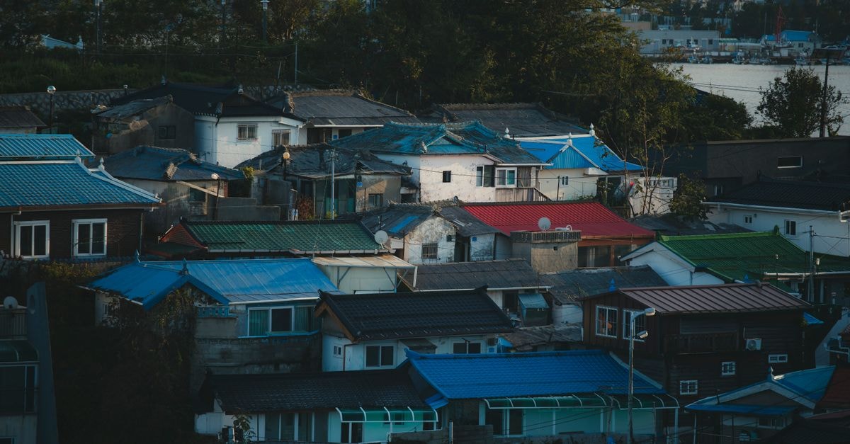 A Quiet Pocket of Korea: A Seongnam-si Travel Guide Aerial view of vibrant rooftops in Gangneung city, showcasing colorful architecture.