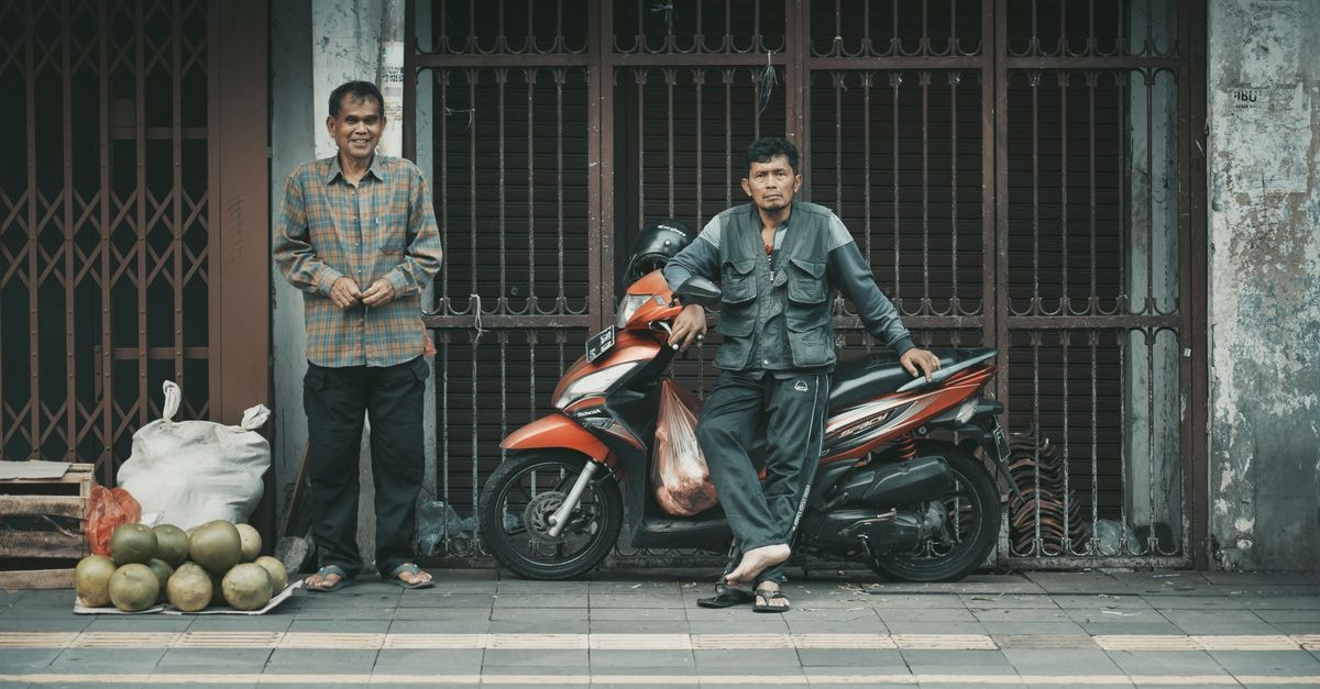 Hotel Royal, Bogor: Classical-Meets-Modern Stay Near the Botanical Gardens Two street vendors with motorbike and produce in Jakarta, Indonesia