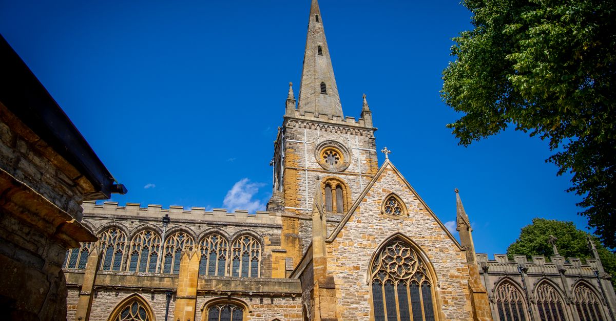 Beautiful low angle view of the historic church in Stratford-upon-Avon against a clear blue sky.
