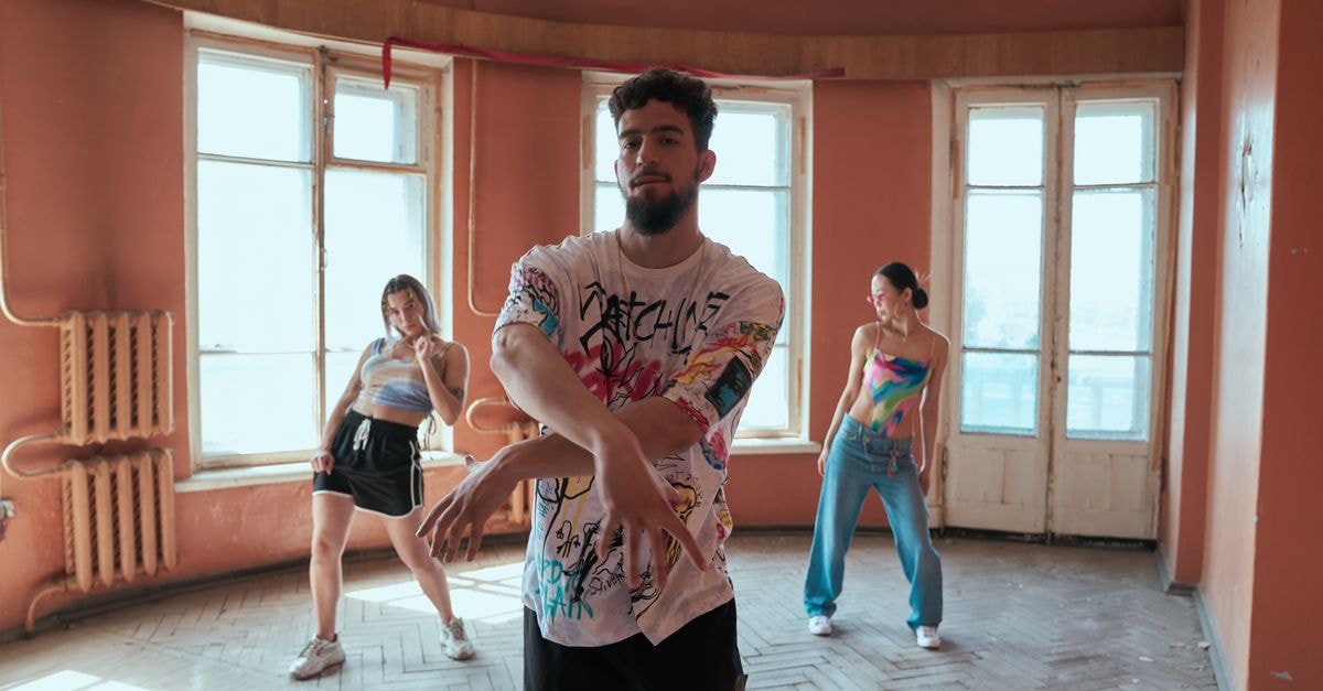 Cardi B's 'Safe' Featuring Kehlani Wins Best Hip-Hop at the 2026 MTV VMAs Three diverse dancers showcase hip-hop moves in a vintage styled room, exuding energy and creativity.