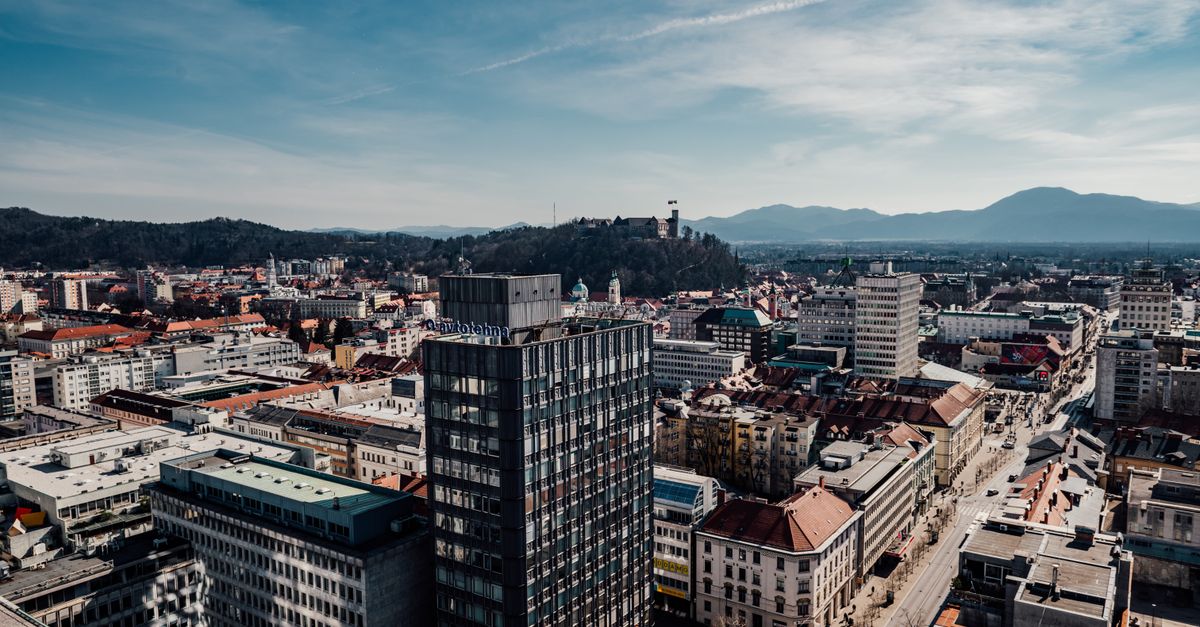 Ljubljana Travel Guide: Planning a July 2026 Trip to Slovenia's Compact Capital A breathtaking aerial shot showcasing Ljubljana's vibrant cityscape under a clear blue sky.