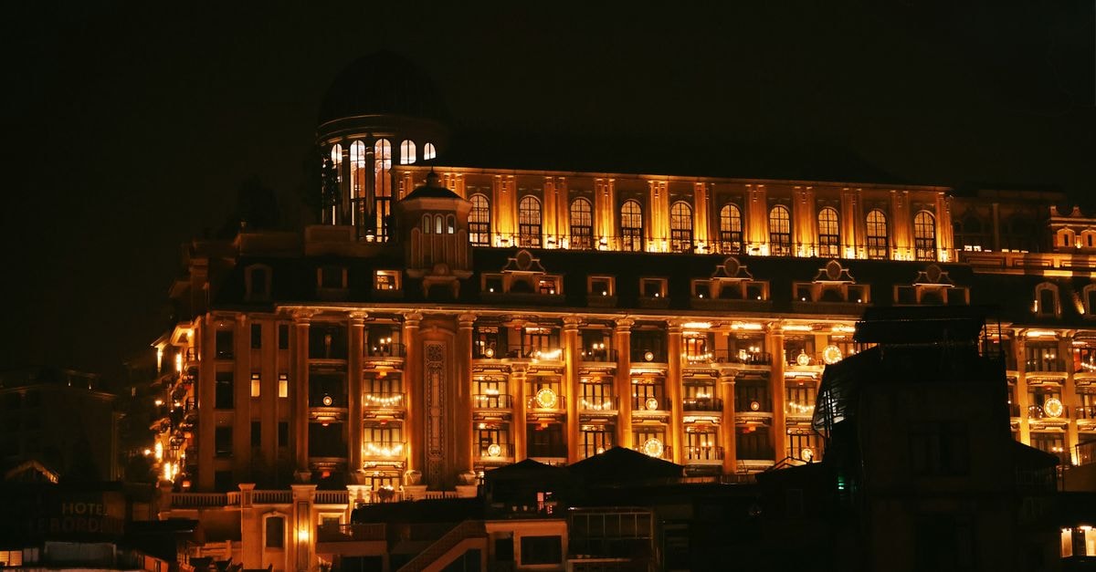 Stunning nighttime view of an illuminated hotel facade in Sa Pa, Lao Cai, Vietnam.