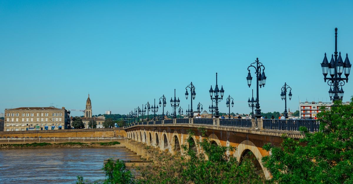 Super 8 Pierre SD in Pierre: Downtown Spot on West Sioux Avenue Elegant view of Pont de Pierre bridge in Bordeaux, France on a sunny day.