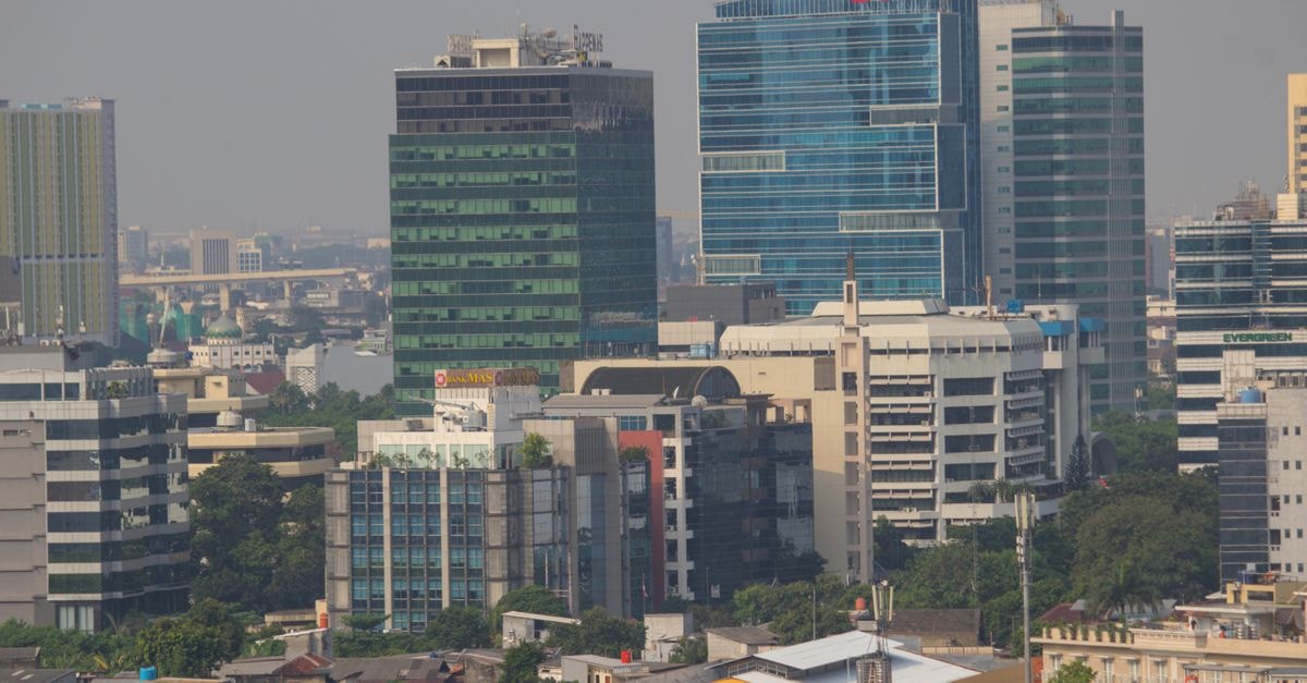 The Margo Hotel, Depok — The Star of Margocity's 2015 Debut Aerial view of Jakarta's urban skyline showcasing modern skyscrapers and bustling city life.