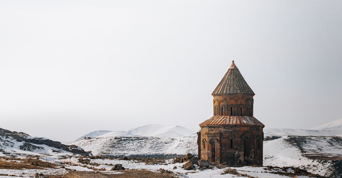 Kars Travel Guide: A Quiet Crossroads in Eastern Anatolia Scenic capture of a historic church in snow-covered Kars, Türkiye.