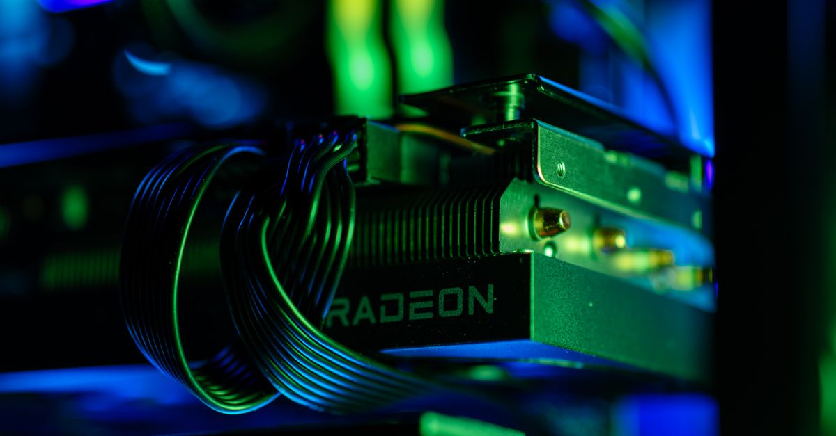 AMD-Samsung HBM4 Supply Deal Nears Completion as Helios AI Rack Launch Looms Detailed close-up of a gaming PC's Radeon graphics card with vibrant RGB lighting, showcasing cables and hardware.