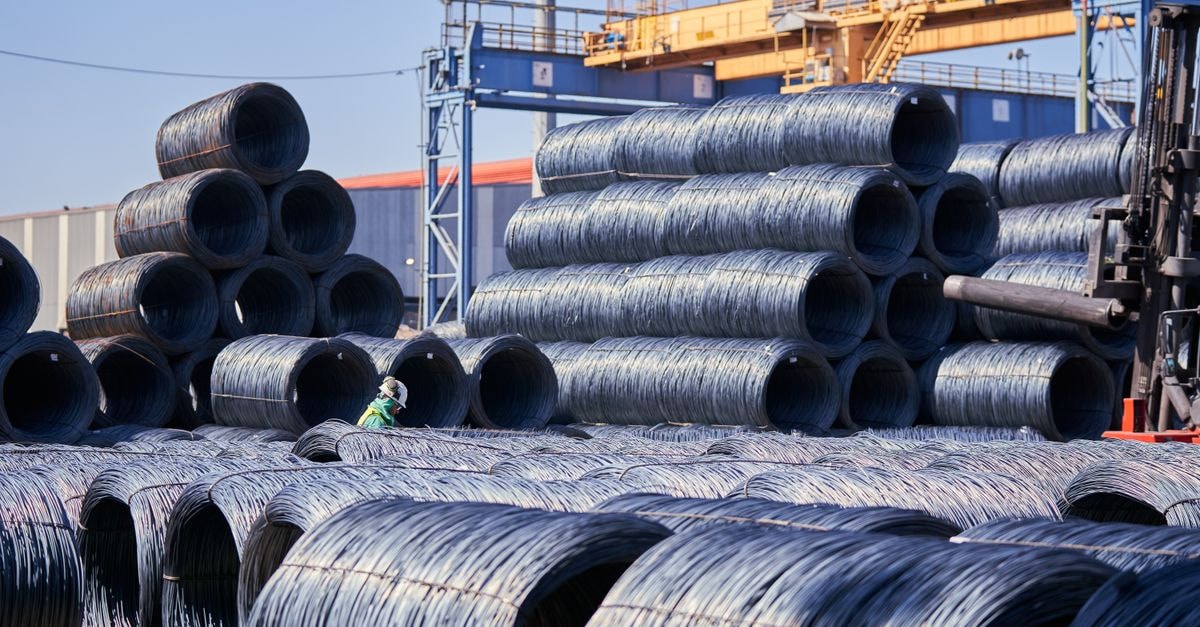 Tata Steel Pivots to Value-Added Products as Indonesia Advances in Global Steel Rankings Large stacks of steel wire coils stored outdoors at an industrial site under bright daylight.