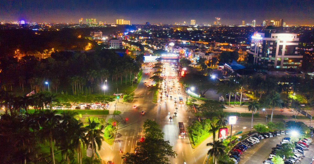 Trembesi Hotel in South Tangerang: Panoramic Views in BSD City Explore the vibrant cityscape of Banten, Indonesia with this stunning aerial night view. Perfect for travel and urban themes.