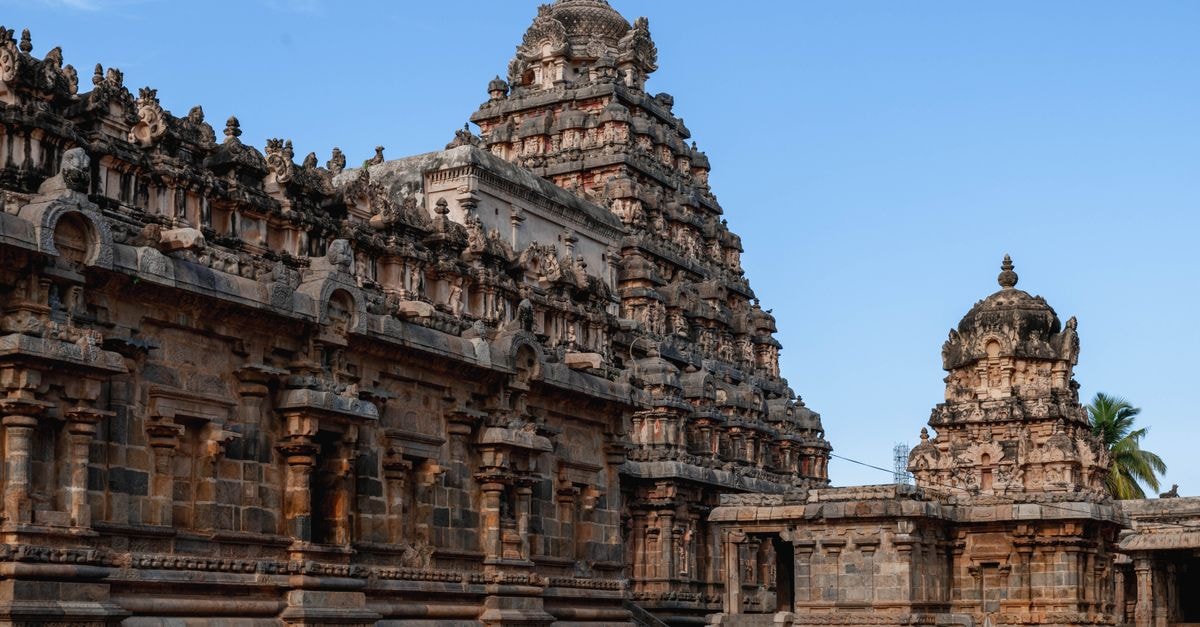 DSR Madhanam Residency in Kumbakonam: A Convenient Stop on the Bypass Road Detailed view of the Airavatesvara Temple's stone carvings in Tamil Nadu, India, showcasing Chola architecture.
