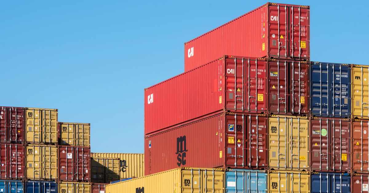 Makenita expands Sisson West tungsten claims; U.S. faces 2027 deadline to halt Chinese imports A vibrant collection of stacked shipping containers under a clear, blue sky. Ideal for logistic themes.