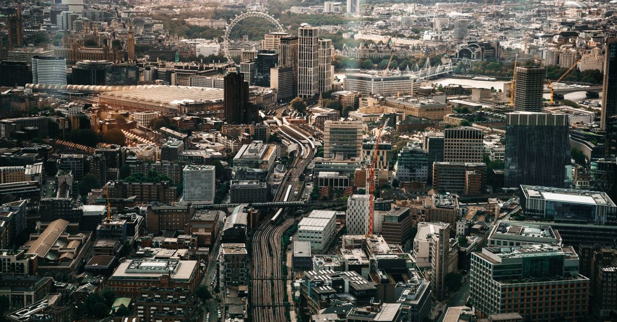 Great Scotland Yard Hotel, London: A Boutique Stay Near Whitehall Stunning aerial view of London's bustling cityscape featuring iconic landmarks and urban architecture.