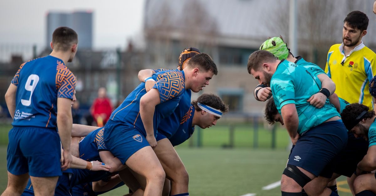 Caernarfon Rugby Club wins UK Rugby Kitchen of the Year Rugby players engage in a dynamic and powerful scrummage during a match.