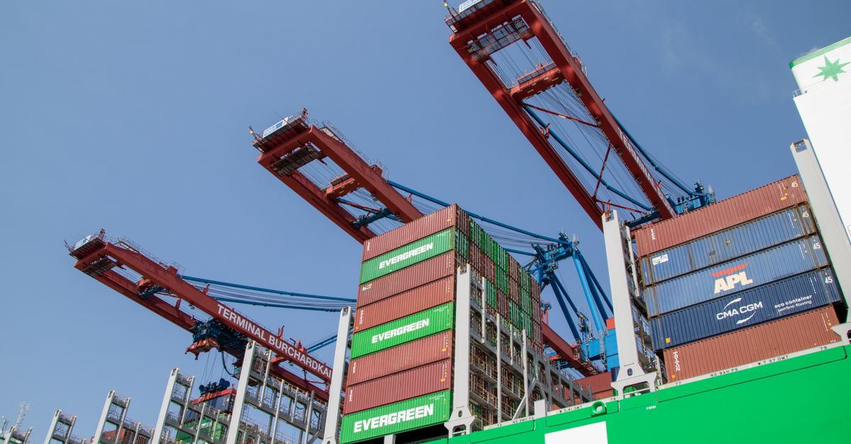 Lithium Prices Slump to Five-Month Low as Mine Restarts and African Export Corridors Reshape Supply Low-angle view of cargo cranes and shipping containers at Hamburg port under clear sky.