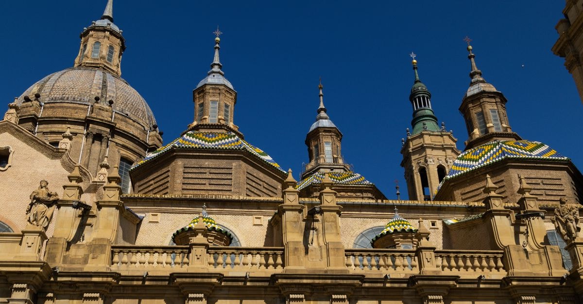 Explore the intricate architecture of the Basilica de Nuestra Señora del Pilar in Zaragoza, Spain.