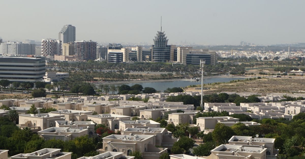 A scenic aerial view of Dubai Silicon Oasis with modern architecture and lush greenery.